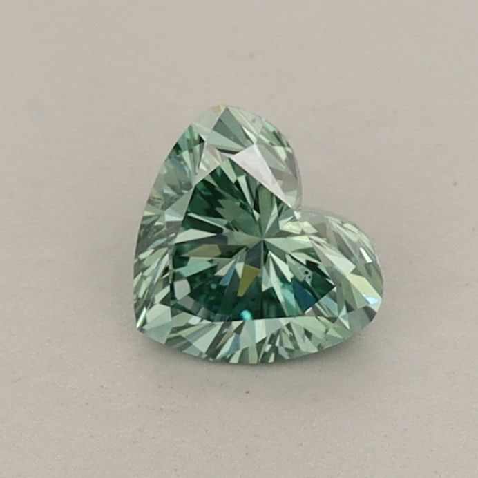 Loose Diamond - HEART 0.46ct Fancy Vivid Green VS2: Loose Diamond - HEART 0.46ct Fancy Vivid Green VS2 Source: This is a real non-mined Diamond that has been grown in a lab Shape: HEART Carats: 0.46 Color: Fancy Vivid Green Certification: IGI Video: