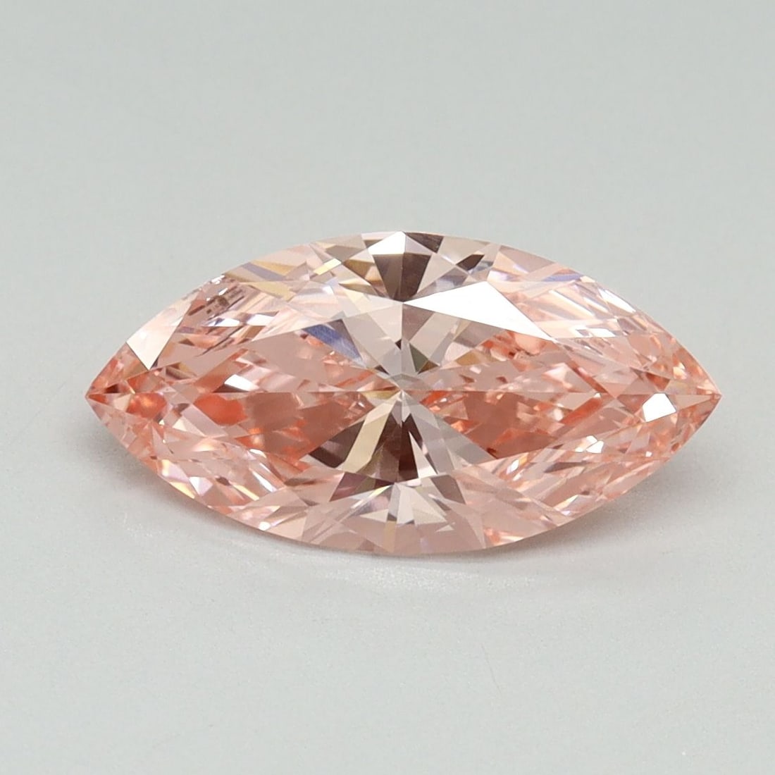 Loose Diamond - MARQUISE 1.61ct Fancy Vivid Pink VS1: Loose Diamond - MARQUISE 1.61ct Fancy Vivid Pink VS1 Source: This is a real non-mined Diamond that has been grown in a lab Shape: MARQUISE Carats: 1.61 Color: Fancy Vivid Pink Certification: IGI Video