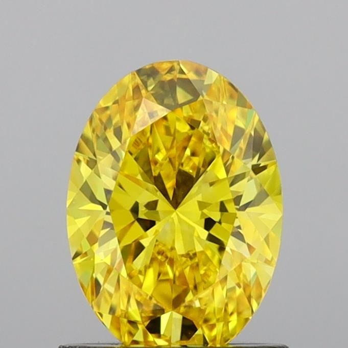 Loose Diamond - OVAL 1.0ct Fancy Vivid Yellow VVS2: Loose Diamond - OVAL 1.0ct Fancy Vivid Yellow VVS2 Source: This is a real non-mined Diamond that has been grown in a lab Shape: OVAL Carats: 1.0 Color: Fancy Vivid Yellow Certification: IGI Video: