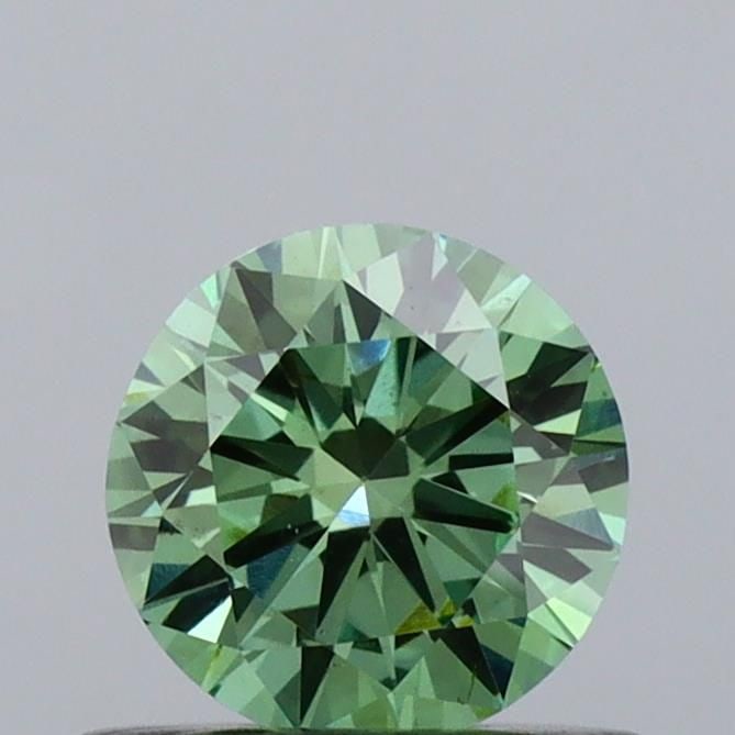 Loose Diamond - ROUND 0.5ct Fancy Vivid Green VS1: Loose Diamond - ROUND 0.5ct Fancy Vivid Green VS1 Source: This is a real non-mined Diamond that has been grown in a lab Shape: ROUND Carats: 0.5 Color: Fancy Vivid Green Certification: IGI Video: