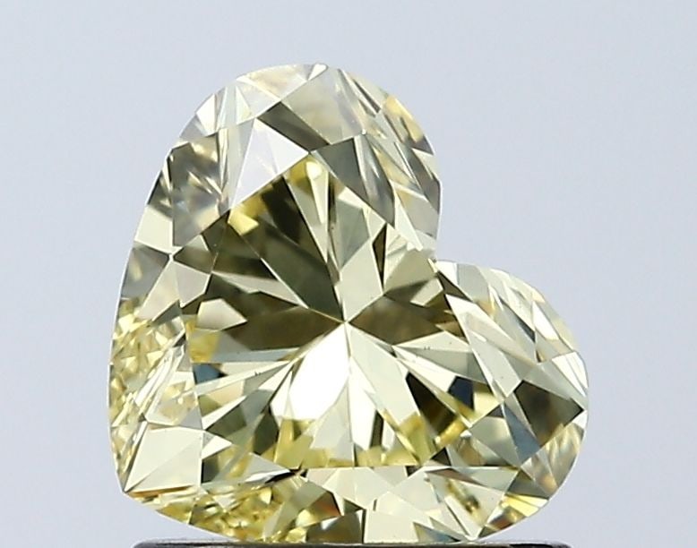 Loose Diamond - HEART 1.04ct Fancy Intense Yellow VS1: Loose Diamond - HEART 1.04ct Fancy Intense Yellow VS1 Source: This is a real non-mined Diamond that has been grown in a lab Shape: HEART Carats: 1.04 Color: Fancy Intense Yellow Certification: IGI Vid
