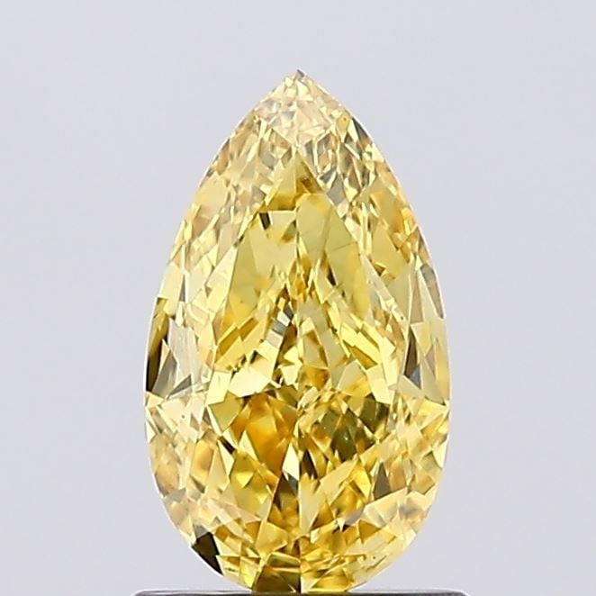 Loose Diamond - PEAR 1.11ct Fancy Vivid Yellow VS2: Loose Diamond - PEAR 1.11ct Fancy Vivid Yellow VS2 Source: This is a real non-mined Diamond that has been grown in a lab Shape: PEAR Carats: 1.11 Color: Fancy Vivid Yellow Certification: IGI Video: