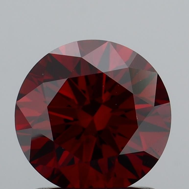 Ideal Loose Diamond - ROUND 1.24ct Fancy Deep Orange VS2: Ideal Loose Diamond - ROUND 1.24ct Fancy Deep Orange VS2 Source: This is a real non-mined Diamond that has been grown in a lab Shape: ROUND Carats: 1.24 Color: Fancy Deep Orange Certification: IGI Vid