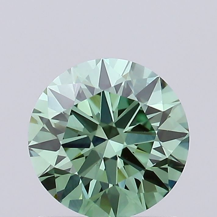 Ideal Loose Diamond - ROUND 0.91ct Fancy Vivid Green VVS2: Ideal Loose Diamond - ROUND 0.91ct Fancy Vivid Green VVS2 Source: This is a real non-mined Diamond that has been grown in a lab Shape: ROUND Carats: 0.91 Color: Fancy Vivid Green Certification: IGI Vi