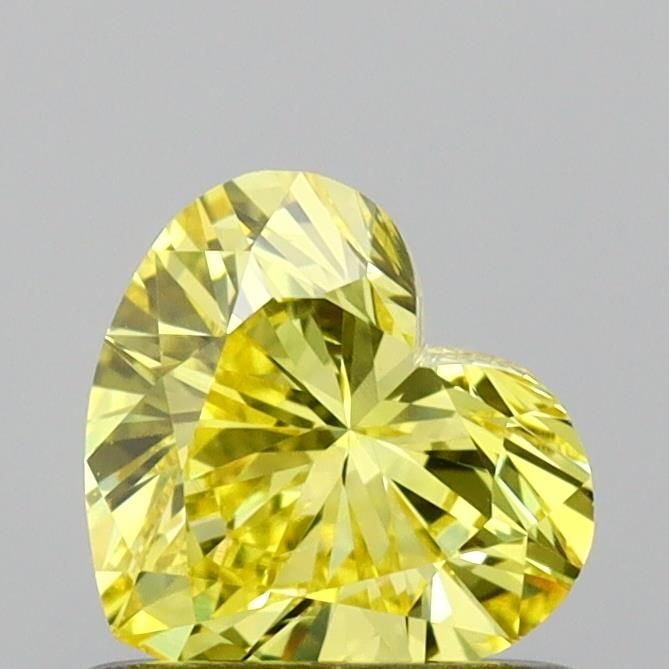 Loose Diamond - HEART 0.65ct Fancy Vivid Yellow VS2: Loose Diamond - HEART 0.65ct Fancy Vivid Yellow VS2 Source: This is a real non-mined Diamond that has been grown in a lab Shape: HEART Carats: 0.65 Color: Fancy Vivid Yellow Certification: IGI Video: