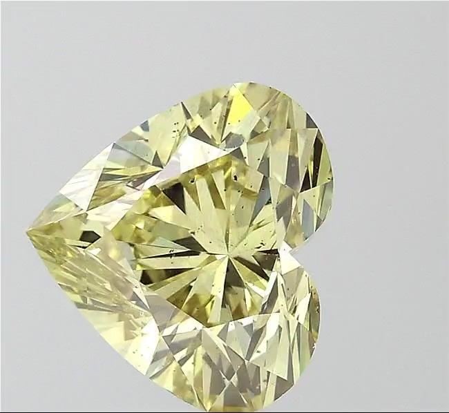 Loose Diamond - HEART 4.0ct Fancy Vivid Yellow VS2: Loose Diamond - HEART 4.0ct Fancy Vivid Yellow VS2 Source: This is a real non-mined Diamond that has been grown in a lab Shape: HEART Carats: 4.0 Color: Fancy Vivid Yellow Certification: NONE Video: