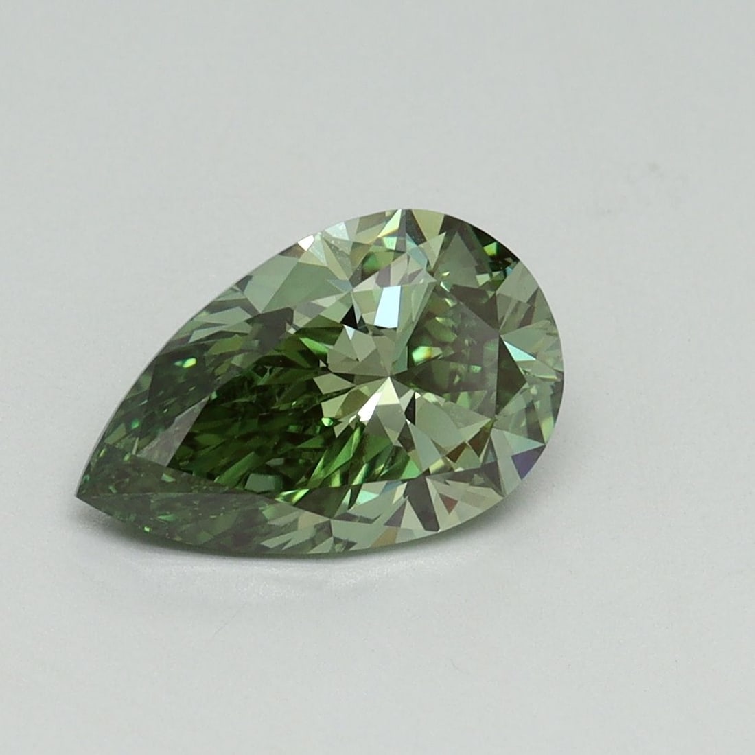 Loose Diamond - PEAR 1.57ct Fancy Vivid Green VVS2: Loose Diamond - PEAR 1.57ct Fancy Vivid Green VVS2 Source: This is a real non-mined Diamond that has been grown in a lab Shape: PEAR Carats: 1.57 Color: Fancy Vivid Green Certification: IGI Video: