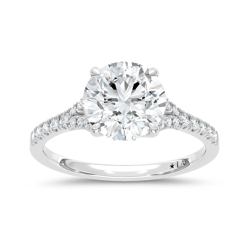 14K White Gold Lab Grown Diamond 2 1/4 Ct.Tw. Round Shape Engagement Ring (Center 2 ctw): 14K White Gold Lab Grown Diamond 2 1/4 Ct.Tw. Round Shape Engagement Ring (Center 2 ctw) This elegant diamond engagement ring crafted in 14k White gold, features a brilliant round-cut center stone of
