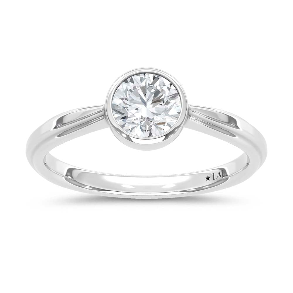 14K White Gold Lab Grown Diamond 3/4 Ct.Tw. Promise Ring: 14K White Gold Lab Grown Diamond 3/4 Ct.Tw. Promise Ring Crafted in polished 14K White Gold, this promise ring showcases lab grown diamonds totaling 3/4 Ct.Tw., delivering meaningful luxury. 10k White