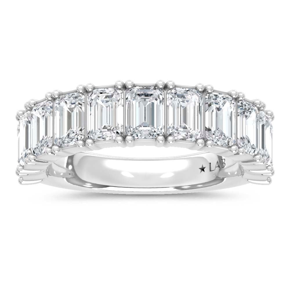 14K White Gold Lab Grown Diamond Emerald Cut Shape 4 Ct.Tw. Half Way Band: 14K White Gold Lab Grown Diamond Emerald Cut Shape 4 Ct.Tw. Half Way Band Designed for those who appreciate true luxury, this 14K White Gold Band features 4 Ct.Tw. of Emerald Cut Lab Grown Diamonds. T