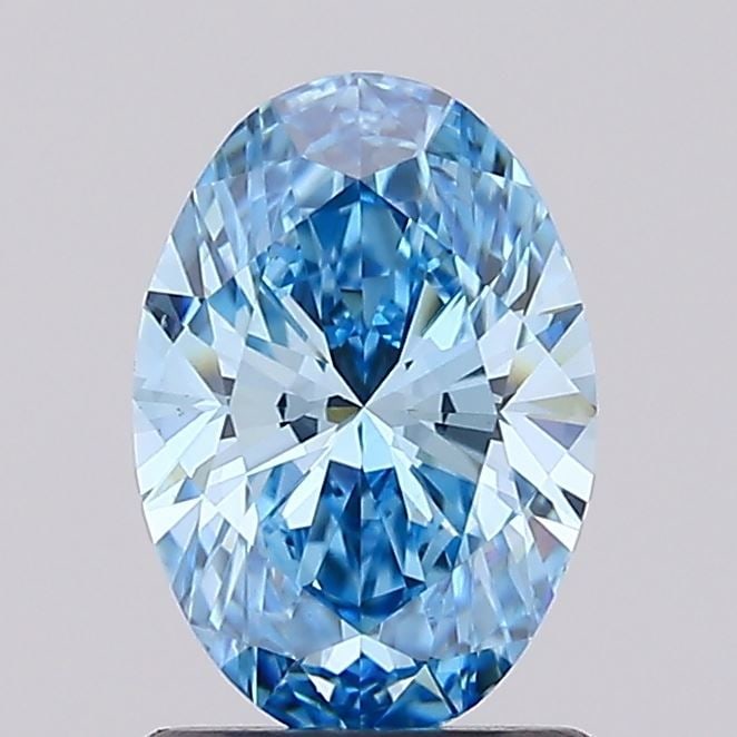 Loose Diamond - OVAL 1.28ct Fancy Vivid Blue VS1: Loose Diamond - OVAL 1.28ct Fancy Vivid Blue VS1 Source: This is a real non-mined Diamond that has been grown in a lab Shape: OVAL Carats: 1.28 Color: Fancy Vivid Blue Certification: IGI Video: