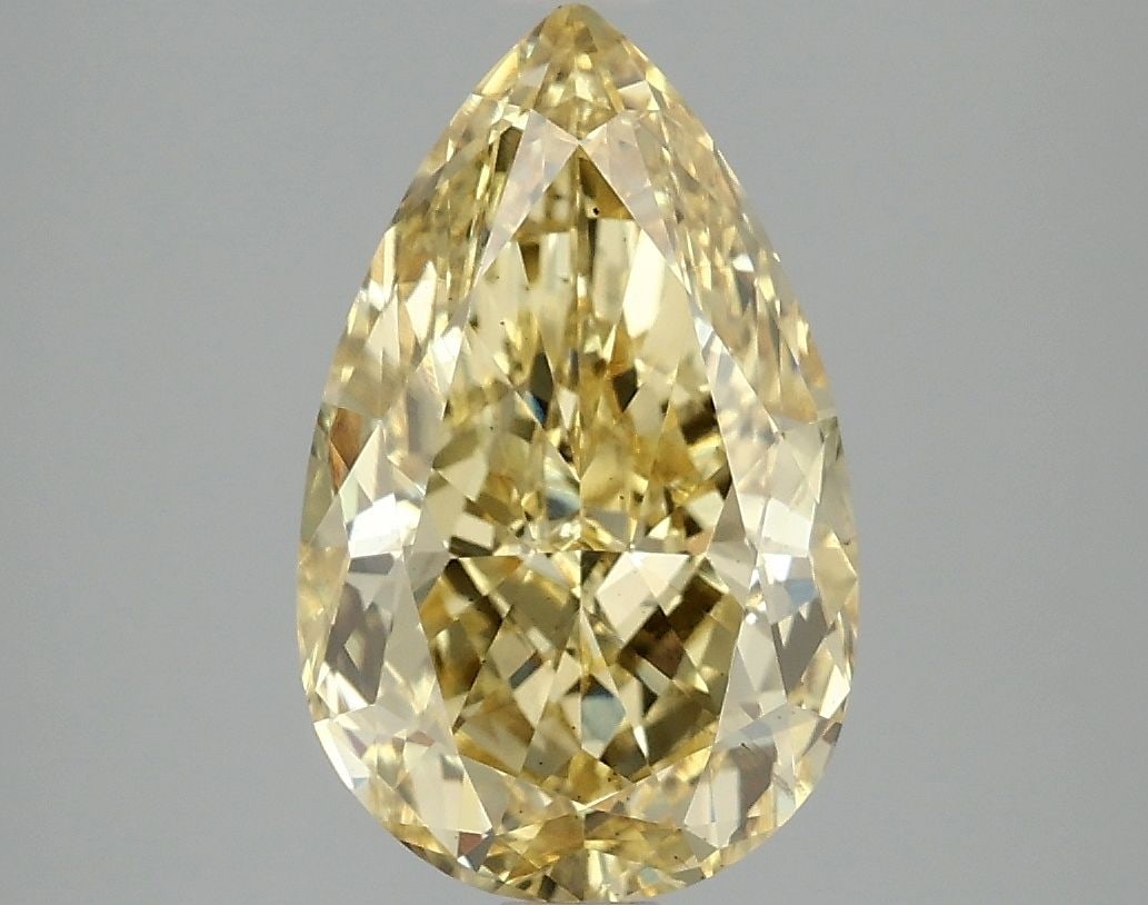 Loose Diamond - PEAR 3.09ct Fancy Vivid Yellow VS2: Loose Diamond - PEAR 3.09ct Fancy Vivid Yellow VS2 Source: This is a real non-mined Diamond that has been grown in a lab Shape: PEAR Carats: 3.09 Color: Fancy Vivid Yellow Certification: IGI Video:
