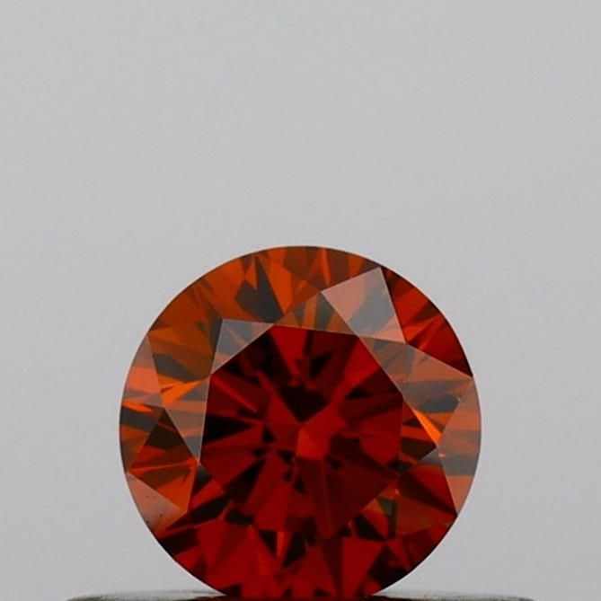 Loose Diamond - ROUND 0.32ct Fancy Deep Orange VS2: Loose Diamond - ROUND 0.32ct Fancy Deep Orange VS2 Source: This is a real non-mined Diamond that has been grown in a lab Shape: ROUND Carats: 0.32 Color: Fancy Deep Orange Certification: IGI Video: