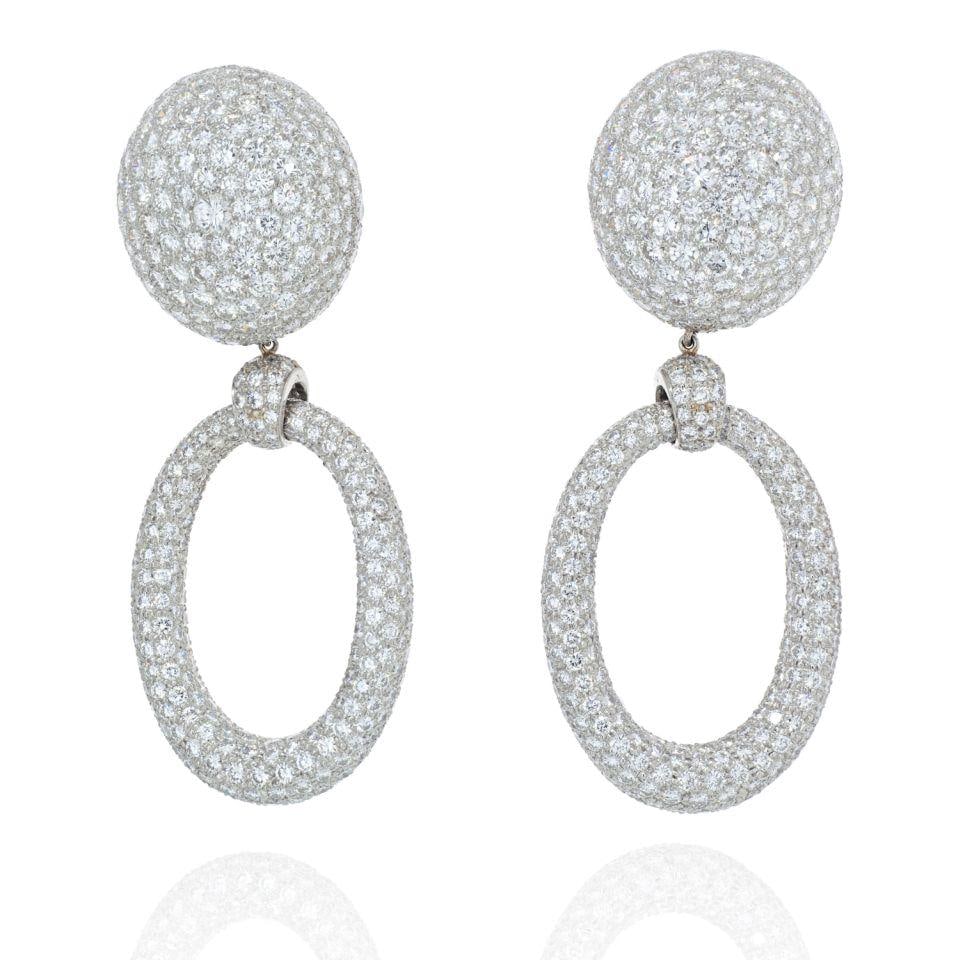 David Webb Bombe Platinum Earrings 56.84 Carats Unique Design: David Webb Bombe Platinum Earrings 56.84 Carats Unique Design Elevate your elegance with these stunning David Webb Bombe Hanging Door Knocker Earrings, crafted in luxurious platinum. These exquisite e