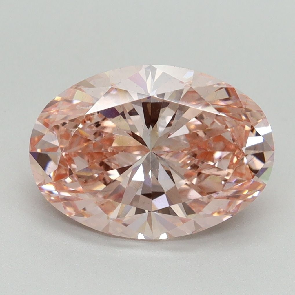 Loose Diamond - OVAL 3.03ct Fancy Vivid Pink VS2: Loose Diamond - OVAL 3.03ct Fancy Vivid Pink VS2 Source: This is a real non-mined Diamond that has been grown in a lab Shape: OVAL Carats: 3.03 Color: Fancy Vivid Pink Certification: IGI Video: