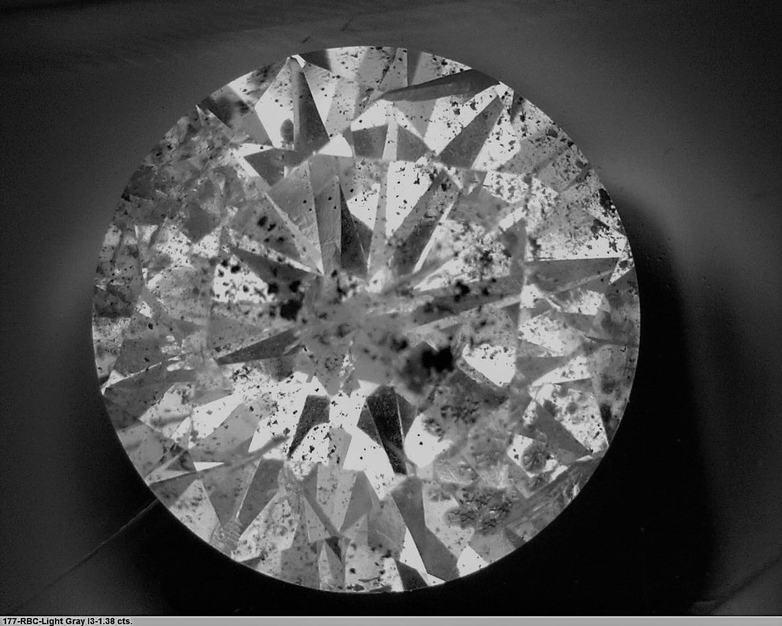 Loose Diamond - ROUND 1.38ct Fancy Light Gray I3: Loose Diamond - ROUND 1.38ct Fancy Light Gray I3 Source: Natural Shape: ROUND Carats: 1.38 Color: Fancy Light Gray Certification: GIA The Diamond Depot Guarantee: All items in this auction are guarant
