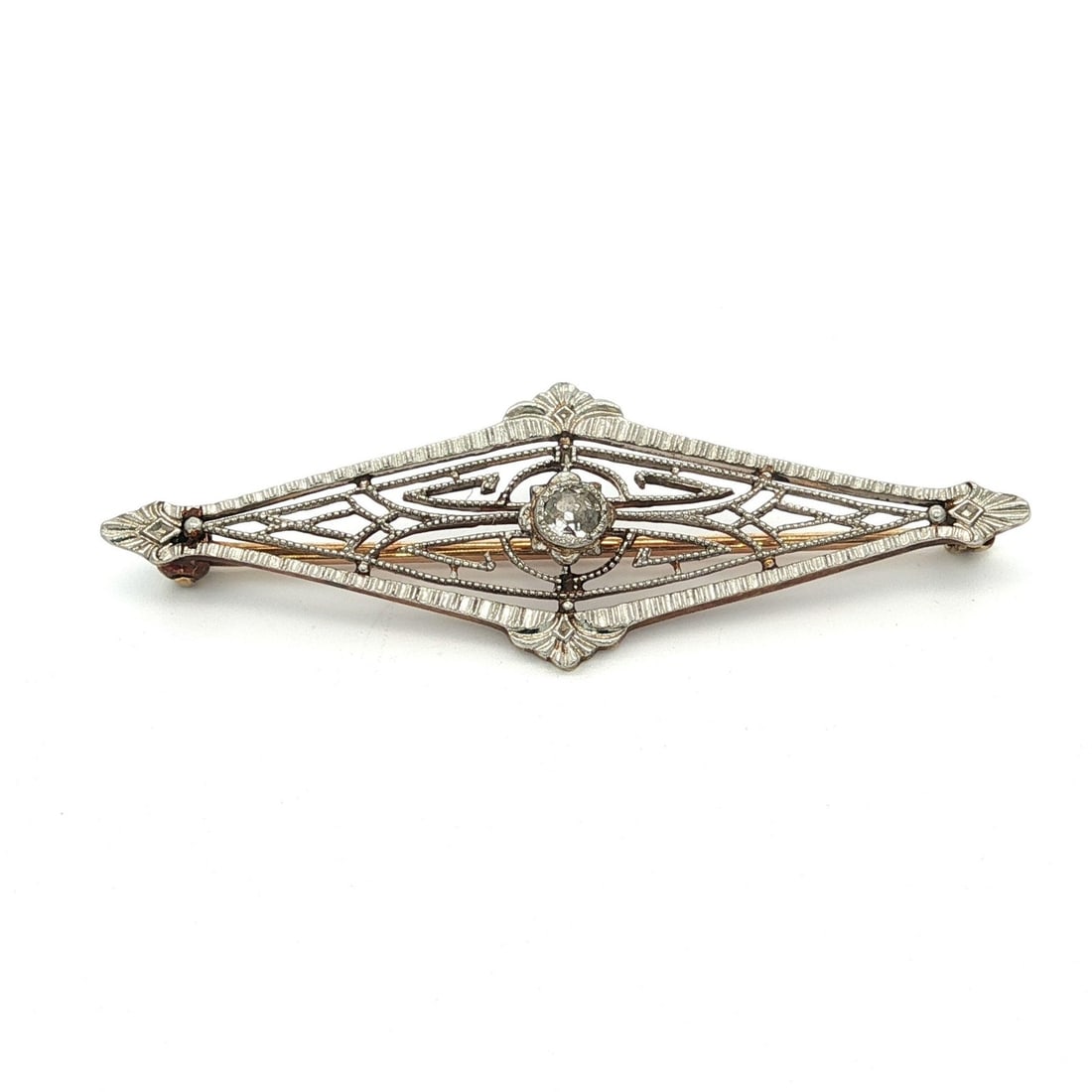 Edwardian 14k Gold Platinum Diamond Lozenge Brooch Antique Design: Edwardian 14k Gold Platinum Diamond Lozenge Brooch Antique Design This exquisite Antique Edwardian brooch showcases an elegant lozenge design crafted from solid 14k yellow gold and adorned with a