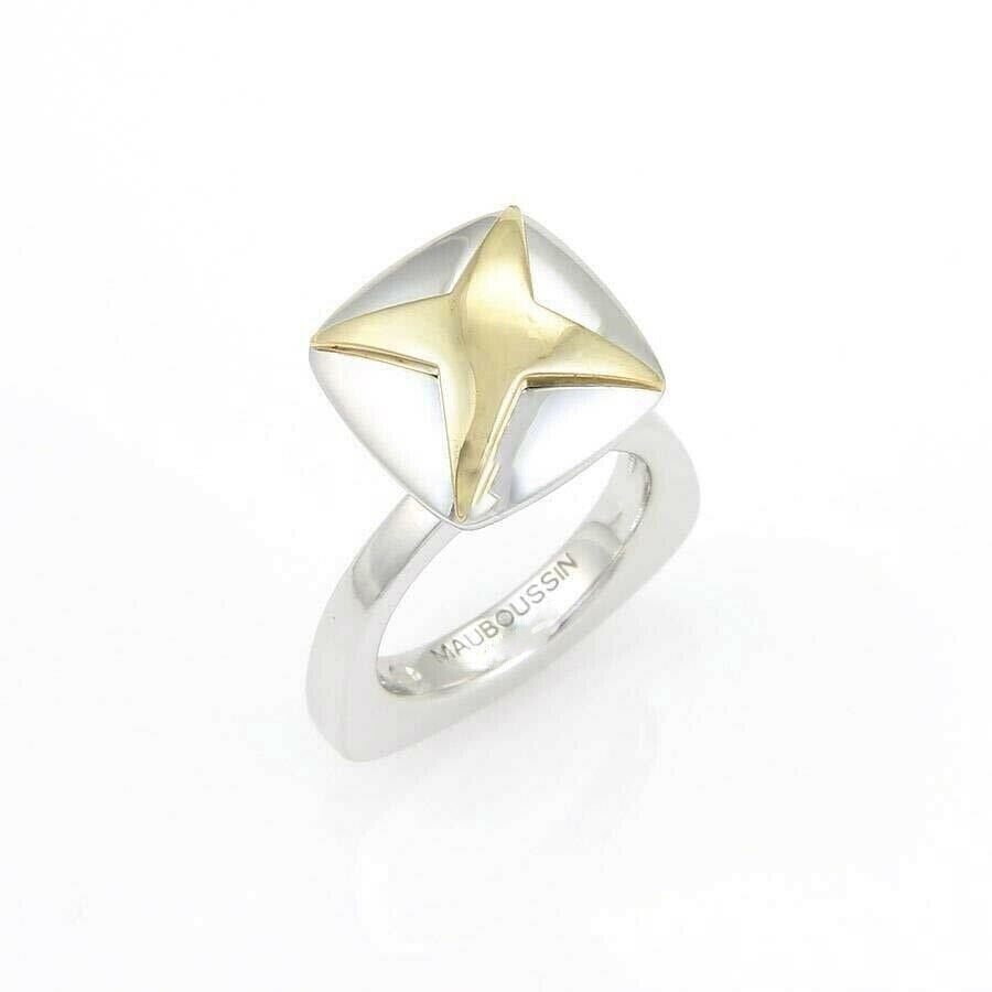 Star Motif 18k Yellow and White Gold Mauboussin Ring Size 4.5: Star Motif 18k Yellow and White Gold Mauboussin Ring Size 4.5 This Mauboussin ring features a unique star design crafted from solid 18k yellow and white gold. Made in France and signed by Mauboussin,