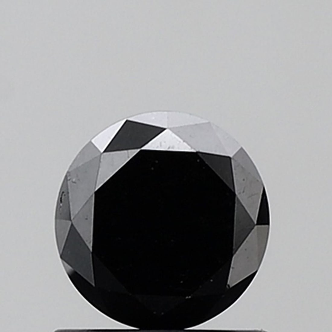 Loose Diamond - ROUND 1.05ct Fancy Black VVS2: Loose Diamond - ROUND 1.05ct Fancy Black VVS2 Source: Natural Shape: ROUND Carats: 1.05 Color: Fancy Black Certification: NONE Video: Video Link The Diamond Depot Guarantee: All items in this