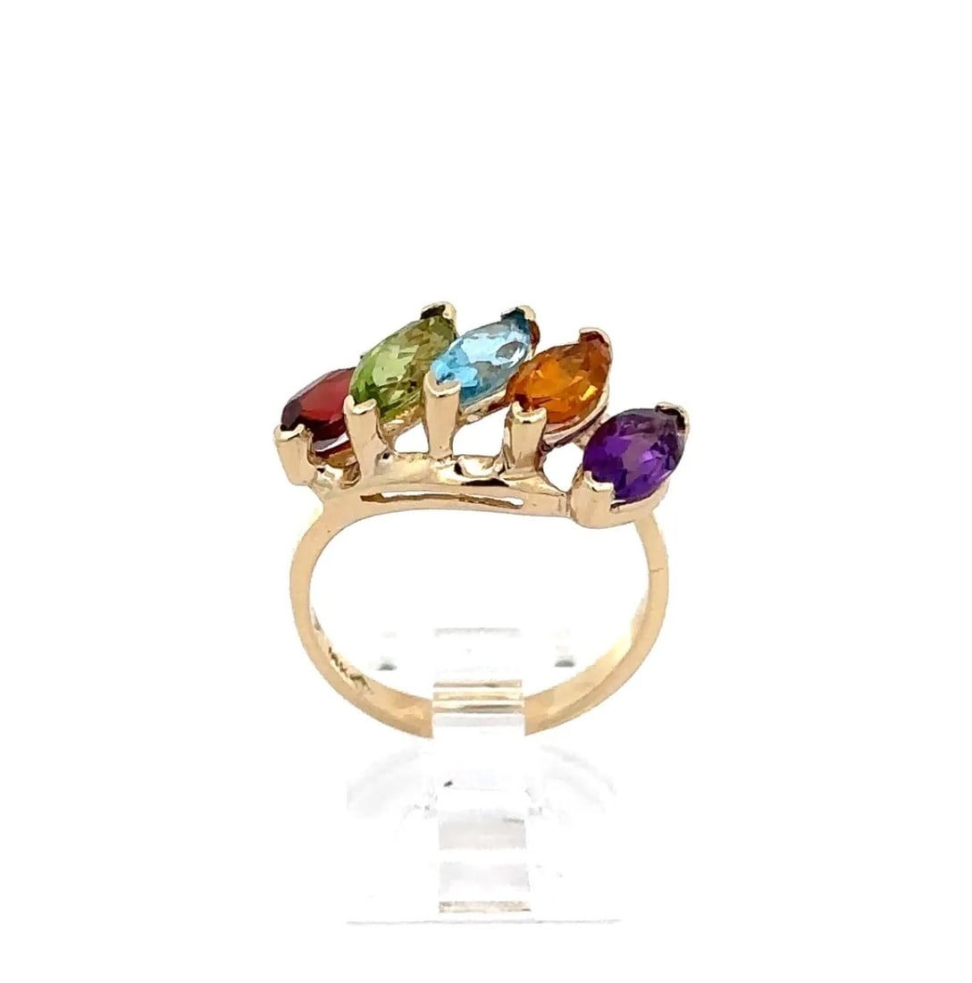 Estate 10K Yellow Gold Marquise Birthstone Cocktail Ring with Amethyst Topaz Citrine Garnet Peridot: Estate 10K Yellow Gold Marquise Birthstone Cocktail Ring with Amethyst Topaz Citrine Garnet Peridot This stunning cocktail band ring features a vibrant array of five natural gemstones, including blue