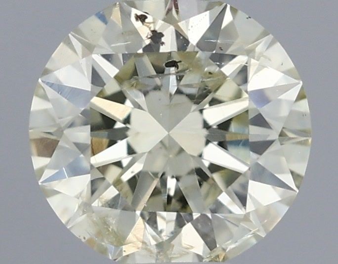 Loose Diamond - ROUND 0.41ct O-P I1: Loose Diamond - ROUND 0.41ct O-P I1 Source: Natural Shape: ROUND Carats: 0.41 Color: O-P Certification: IGI Video: