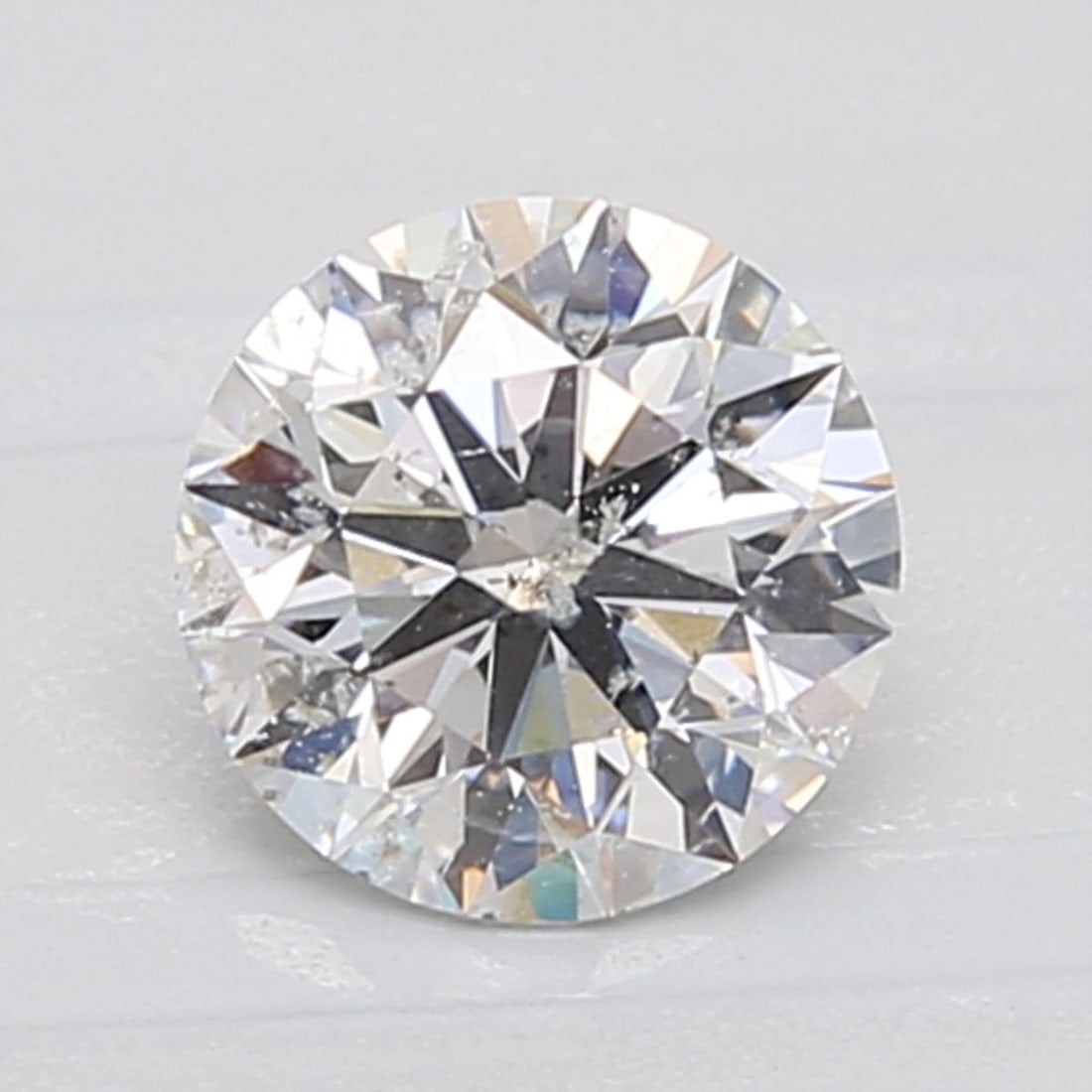 Loose Diamond - ROUND 1.04ct E SI2: Loose Diamond - ROUND 1.04ct E SI2 Source: Natural Shape: ROUND Carats: 1.04 Color: E Clarity: SI2 Certification: IGI Video: