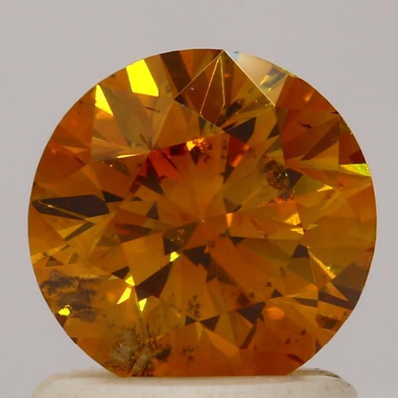 Loose Diamond - ROUND 1.01ct Fancy Deep Yellow Orange SI2: Loose Diamond - ROUND 1.01ct Fancy Deep Yellow Orange SI2 Source: Natural Shape: ROUND Carats: 1.01 Color: Fancy Deep Yellow Orange Certification: GIA Video: