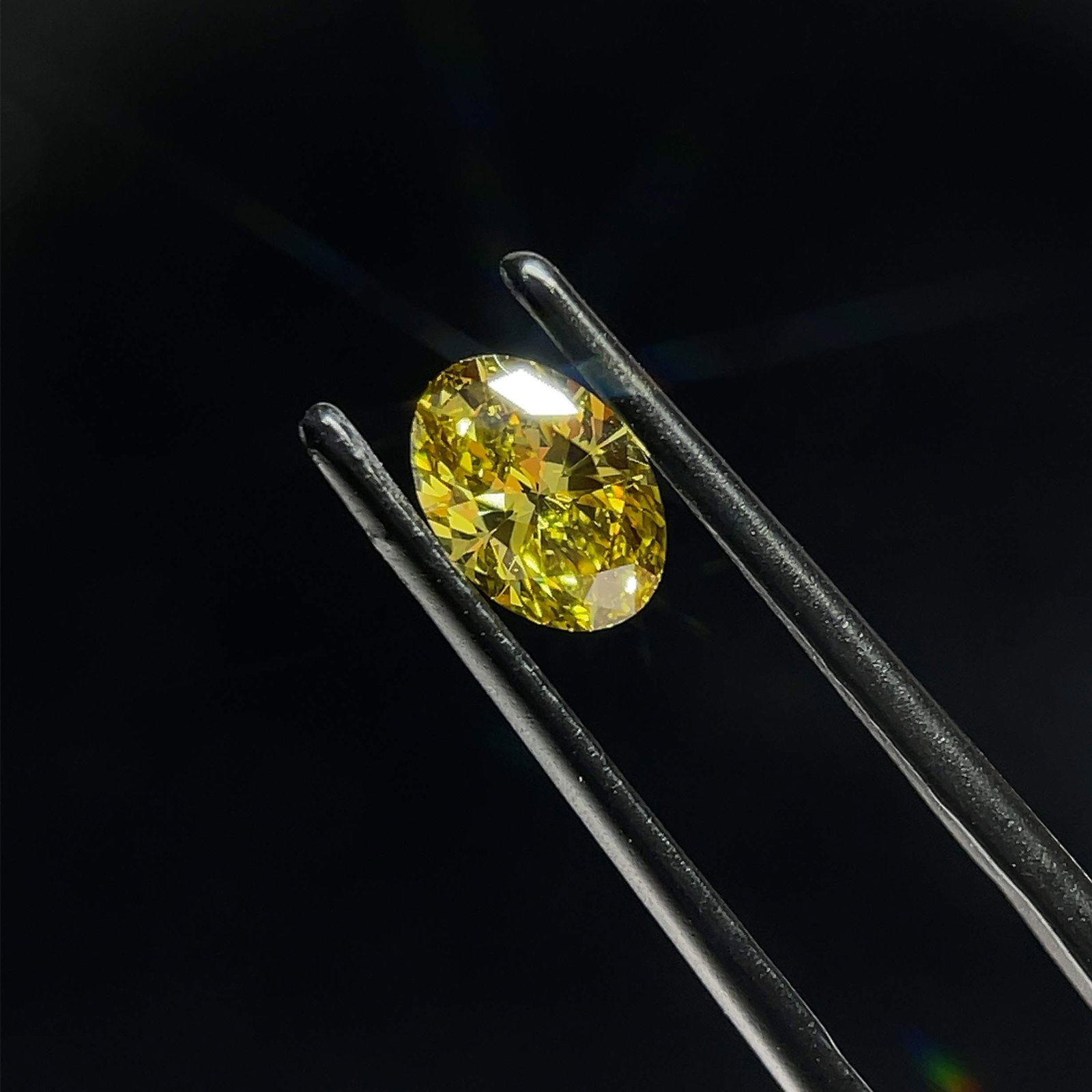 Loose Diamond - OVAL 0.7ct Fancy Intense Gray Yellow VVS2: Loose Diamond - OVAL 0.7ct Fancy Intense Gray Yellow VVS2 Source: This is a real non-mined Diamond that has been grown in a lab Shape: OVAL Carats: 0.7 Color: Fancy Intense Gray Yellow Certification: