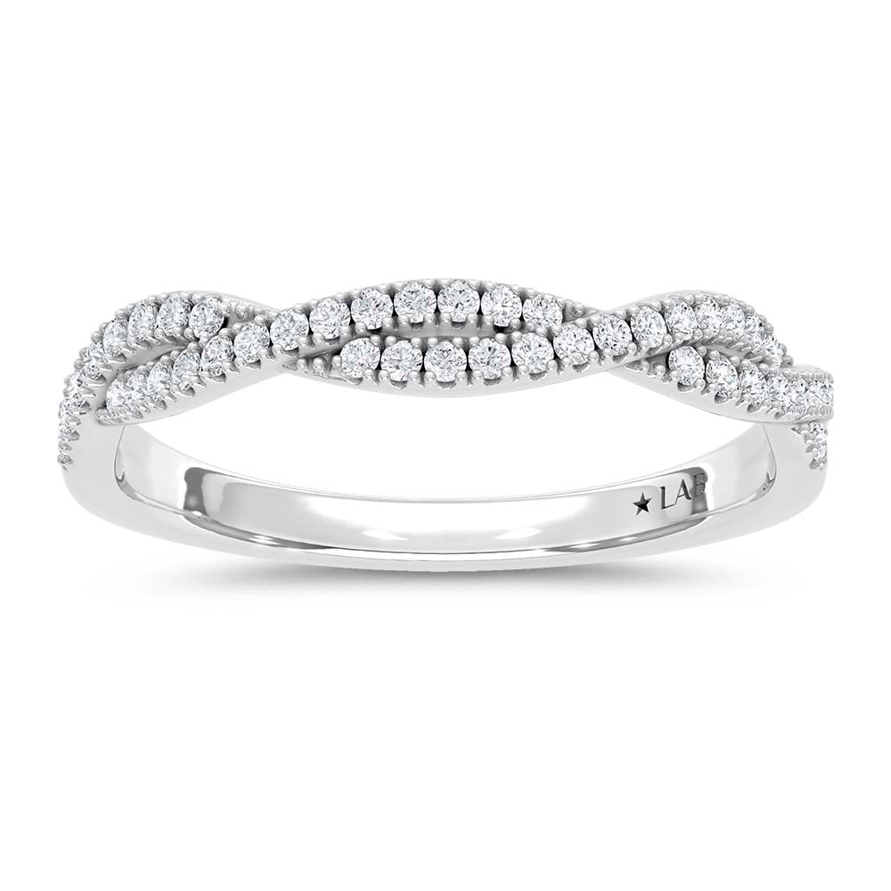 14K White Gold Lab Grown Round Diamond 1/5 Ct.Tw. Wedding Band: 14K White Gold Lab Grown Round Diamond 1/5 Ct.Tw. Wedding Band This elegant 14K White Gold Wedding Band, featuring 1/5 Ct.Tw. of round Lab Grown Diamonds, is a luxurious testament to timeless beauty.