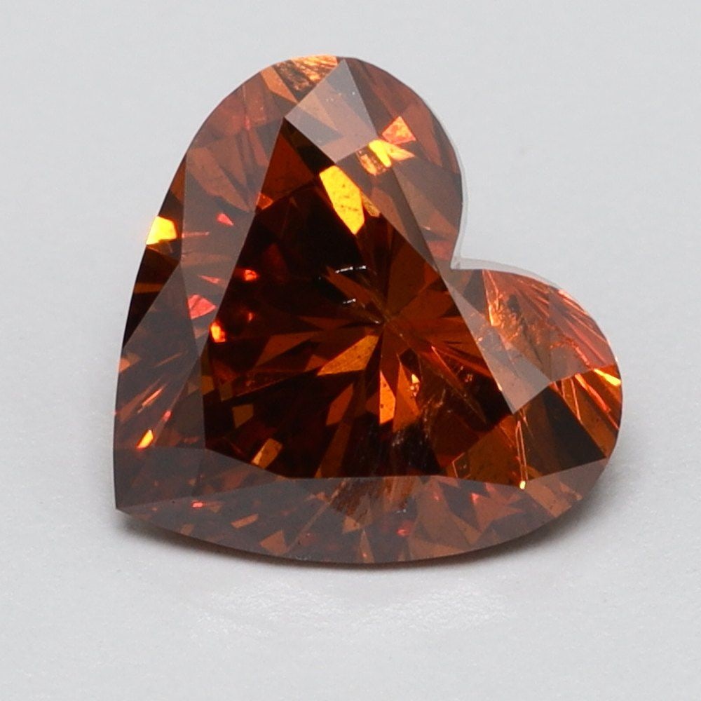 Loose Diamond - HEART 0.72ct Fancy Red SI2: Loose Diamond - HEART 0.72ct Fancy Red SI2 Source: This is a real non-mined Diamond that has been grown in a lab Shape: HEART Carats: 0.72 Color: Fancy Red Certification: NONE Video: