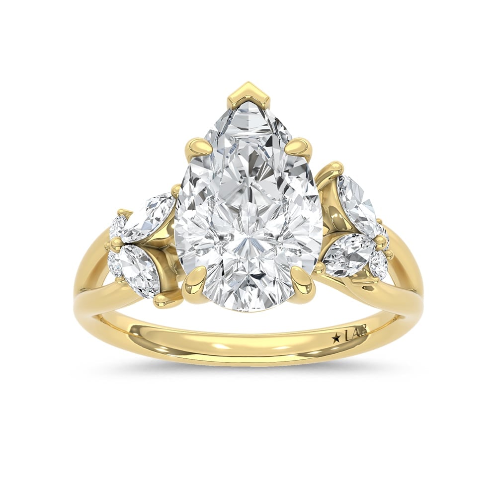 14K Yellow Gold Lab Grown Diamond 2 1/3 Ct.Tw. Pear Shape Engagement Ring (Center 3 ct): 14K Yellow Gold Lab Grown Diamond 2 1/3 Ct.Tw. Pear Shape Engagement Ring (Center 3 ct) 14k Yellow Gold Stone Color: D-f Stone Clarity: Vs Each ring is presented in standard size 6.5. Complimentary re