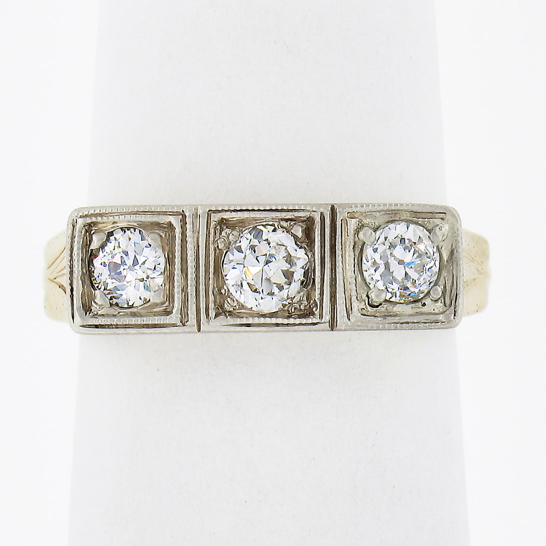 Edwardian 14K Gold 0.52ct Diamond Filigree Three Stone Band Ring: Edwardian 14K Gold 0.52ct Diamond Filigree Three Stone Band Ring This exquisite Antique Edwardian band ring features a stunning design crafted from solid 14K yellow gold with a 14K white gold top. The