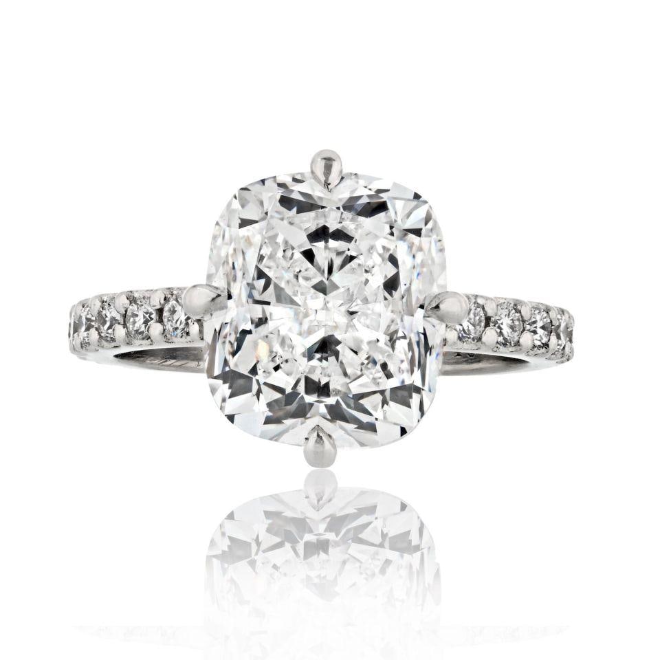 5.06 Carat GIA E Color VS1 Cushion Cut Diamond Engagement Ring: 5.06 Carat GIA E Color VS1 Cushion Cut Diamond Engagement Ring Discover the ultimate symbol of love with this stunning 5 Carat Cushion Cut Diamond Engagement Ring, showcasing a magnificent 5.06-carat