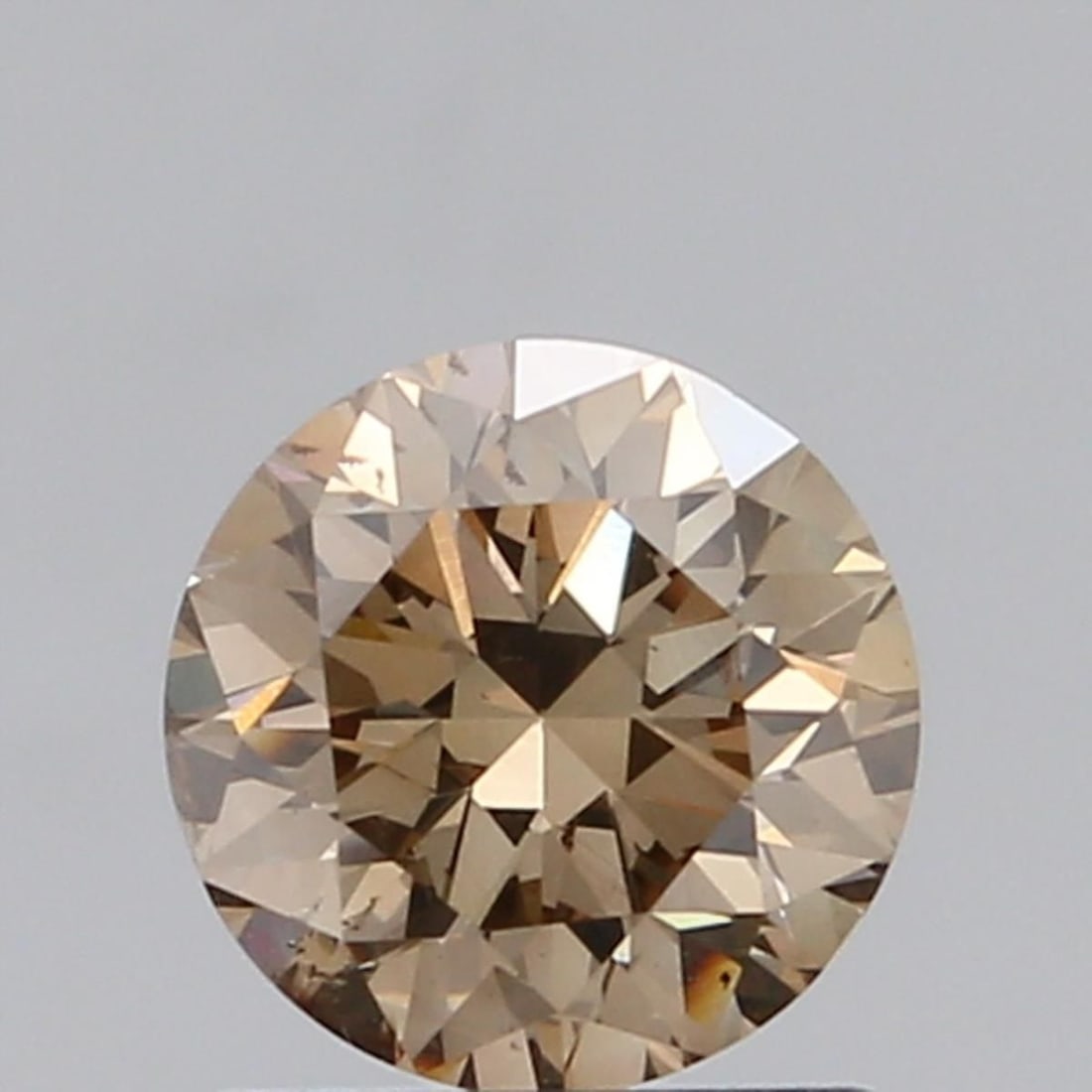Loose Diamond - ROUND 1.04ct Fancy Brown SI1: Loose Diamond - ROUND 1.04ct Fancy Brown SI1 Source: Natural Shape: ROUND Carats: 1.04 Color: Fancy Brown Certification: NONE Video: