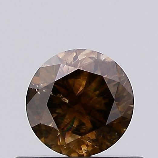 Loose Diamond - ROUND 0.4ct Fancy Brown I3: Loose Diamond - ROUND 0.4ct Fancy Brown I3 Source: Natural Shape: ROUND Carats: 0.4 Color: Fancy Brown Certification: NONE Video: