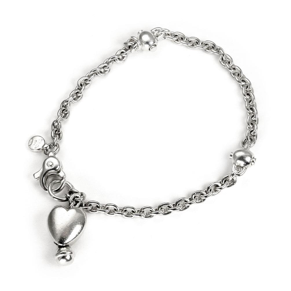 Tiffany & Co. Sterling Silver Heart Charm Chain Bracelet: Tiffany & Co. Sterling Silver Heart Charm Chain Bracelet Discover the timeless elegance of this authentic vintage Tiffany & Co. chain bracelet, expertly crafted from sterling silver. This exquisite pi