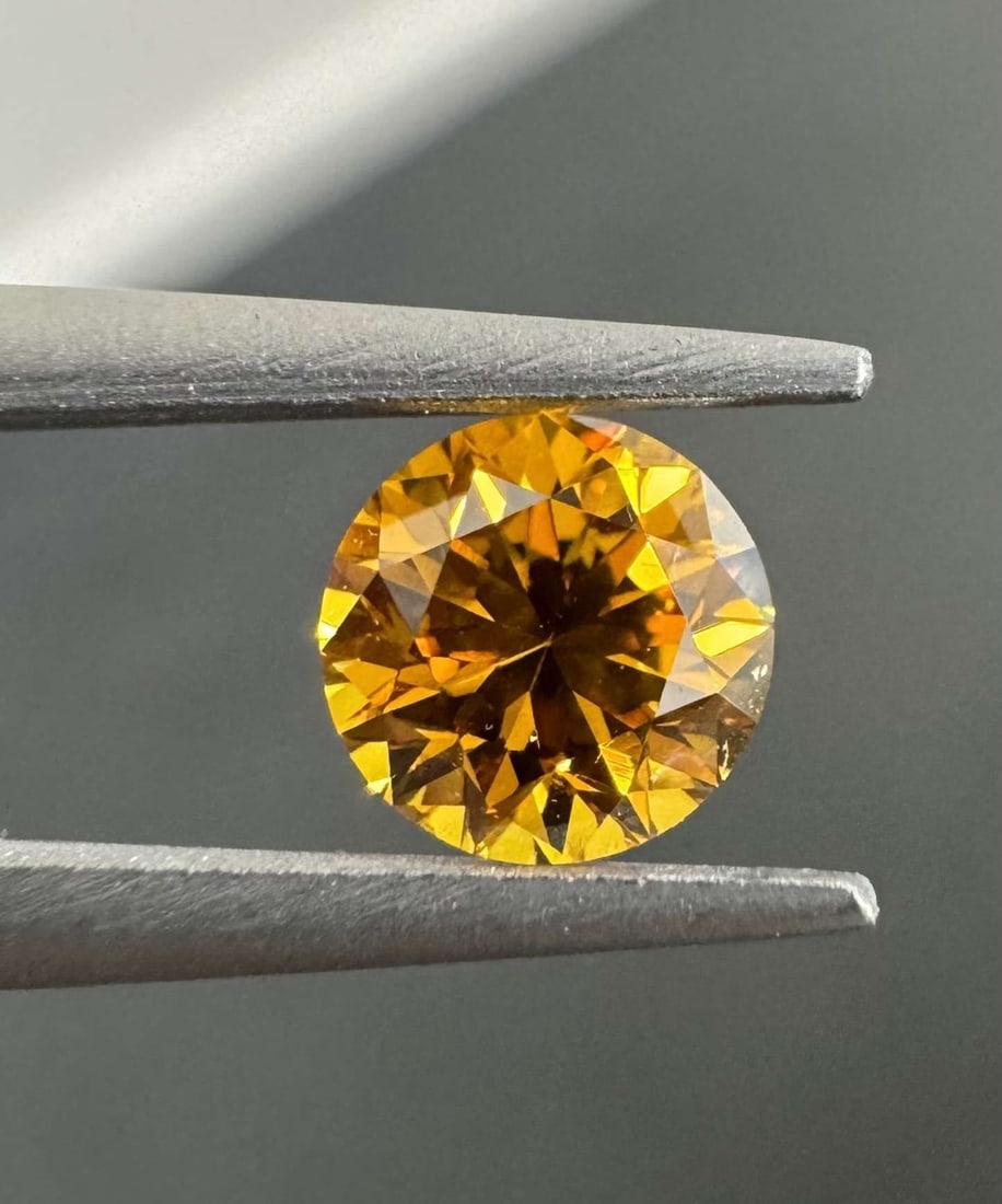 Loose Diamond - ROUND 0.44ct Fancy Deep Yellow Orange SI1: Loose Diamond - ROUND 0.44ct Fancy Deep Yellow Orange SI1 Source: Natural Shape: ROUND Carats: 0.44 Color: Fancy Deep Yellow Orange Certification: GIA Video:
