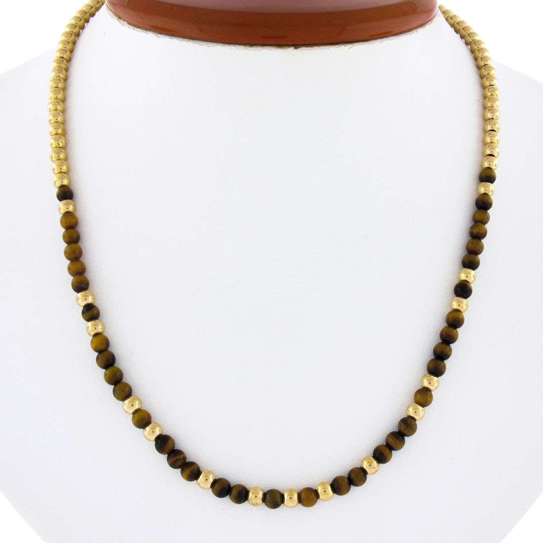Vintage 14k Yellow Gold Tigers Eye Bead Ball Slide Necklace 17": Vintage 14k Yellow Gold Tigers Eye Bead Ball Slide Necklace 17" This exquisite vintage necklace showcases a striking array of natural Tiger's Eye beads, complemented by polished yellow gold beads. Cra