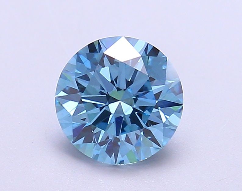 Ideal Loose Diamond - ROUND 1.57ct Fancy Vivid Blue VS2: Ideal Loose Diamond - ROUND 1.57ct Fancy Vivid Blue VS2 Source: This is a real non-mined Diamond that has been grown in a lab Shape: ROUND Carats: 1.57 Color: Fancy Vivid Blue Certification: IGI