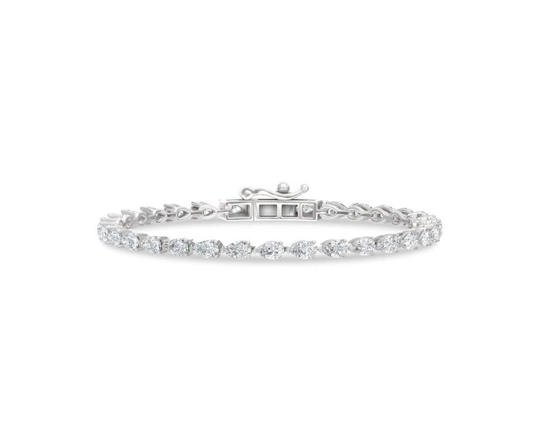 14K White Gold Lab Grown Diamond 5 1/8 Ct.Tw. Fashion Bracelet: 14K White Gold Lab Grown Diamond 5 1/8 Ct.Tw. Fashion Bracelet Crafted in polished 14K White Gold, this fashion bracelet features lab grown diamonds totaling 5 1/8 Ct.Tw., delivering sleek luxury and