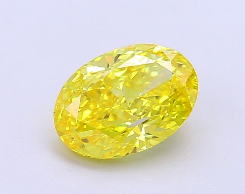 Loose Diamond - OVAL 1.6ct Fancy Vivid Yellow VS1: Loose Diamond - OVAL 1.6ct Fancy Vivid Yellow VS1 Source: This is a real non-mined Diamond that has been grown in a lab Shape: OVAL Carats: 1.6 Color: Fancy Vivid Yellow Certification: IGI Video: