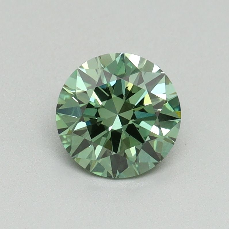 Loose Diamond - ROUND 0.71ct Fancy Vivid Green VS2: Loose Diamond - ROUND 0.71ct Fancy Vivid Green VS2 Source: This is a real non-mined Diamond that has been grown in a lab Shape: ROUND Carats: 0.71 Color: Fancy Vivid Green Certification: IGI Video:
