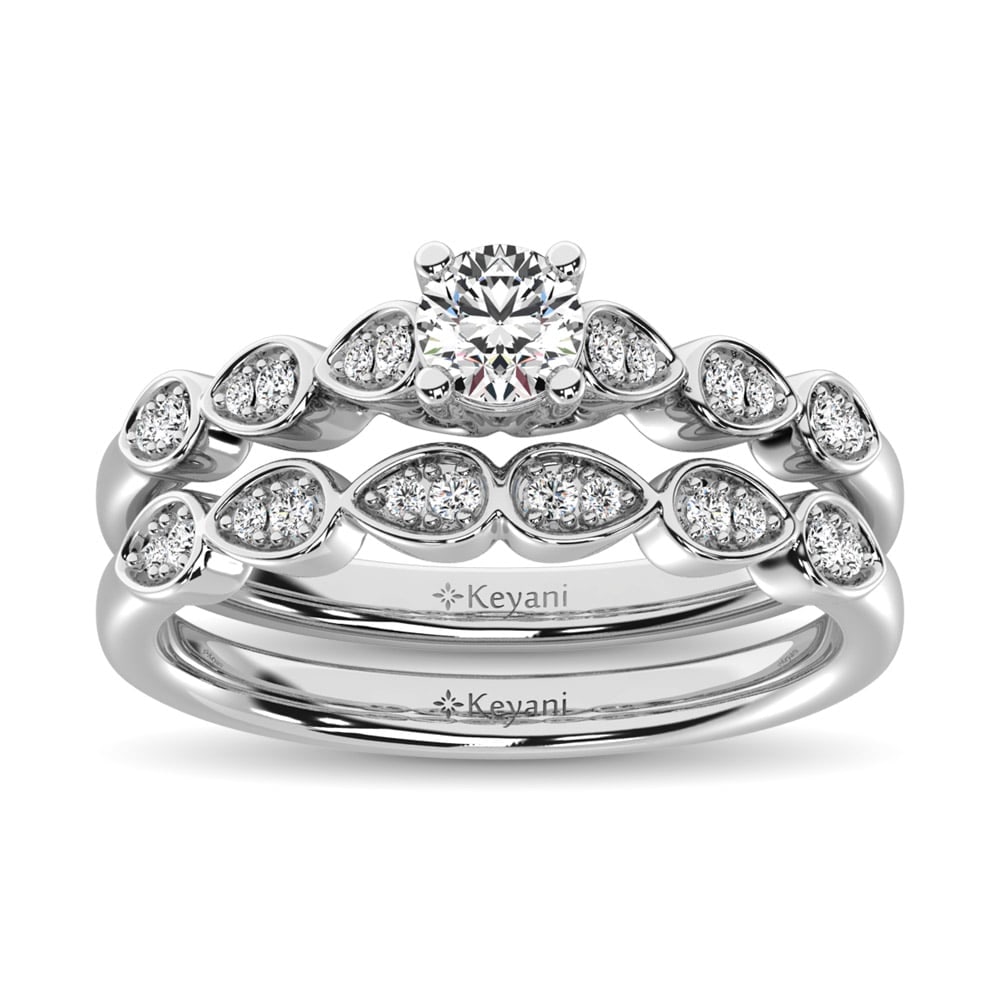 Diamond 1/2 Ct.Tw. Bridal Ring in 14K White Gold: Diamond 1/2 Ct.Tw. Bridal Ring in 14K White Gold 14k White Gold Stone Color: G-h Stone Clarity: Si2 Each ring is presented in standard size 6.5. Complimentary resizing is available between sizes 510 (