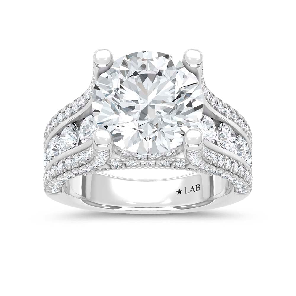 14K White Gold Lab Grown Diamond 6 7/8 Ct.Tw. Engagement Ring (Center 5ct): 14K White Gold Lab Grown Diamond 6 7/8 Ct.Tw. Engagement Ring (Center 5ct) 14k White Gold Stone Color: D-f Stone Clarity: Vs Each ring is presented in standard size 6.5. Complimentary resizing is avai