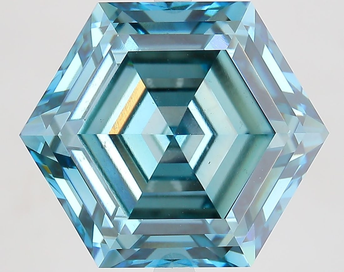 Loose Diamond - HEXAGONAL 13.5ct Fancy Vivid Blue VS2: Loose Diamond - HEXAGONAL 13.5ct Fancy Vivid Blue VS2 Source: This is a real non-mined Diamond that has been grown in a lab Shape: HEXAGONAL Carats: 13.5 Color: Fancy Vivid Blue Certification: IGI Vid
