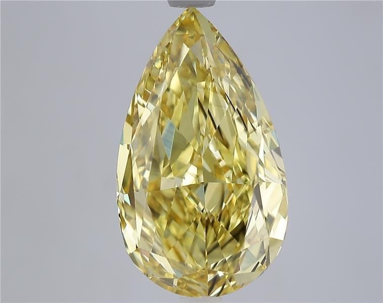 Loose Diamond - PEAR 6.06ct Fancy Vivid Yellow VS2: Loose Diamond - PEAR 6.06ct Fancy Vivid Yellow VS2 Source: This is a real non-mined Diamond that has been grown in a lab Shape: PEAR Carats: 6.06 Color: Fancy Vivid Yellow Certification: IGI Video: