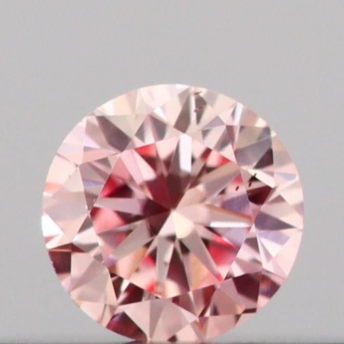 Loose Diamond - ROUND 0.14ct Fancy Pink VS2: Loose Diamond - ROUND 0.14ct Fancy Pink VS2 Source: This is a real non-mined Diamond that has been grown in a lab Shape: ROUND Carats: 0.14 Color: Fancy Pink Certification: IGI Video: Video Link 
