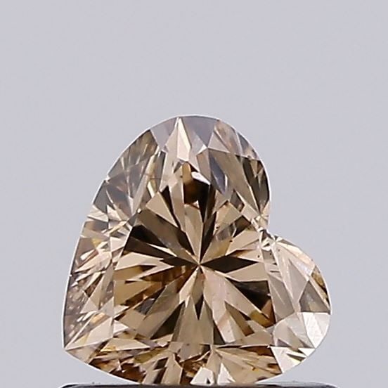 Loose Diamond - HEART 0.66ct Fancy Vivid Brown VS1: Loose Diamond - HEART 0.66ct Fancy Vivid Brown VS1 Source: This is a real non-mined Diamond that has been grown in a lab Shape: HEART Carats: 0.66 Color: Fancy Vivid Brown Certification: NONE Video: