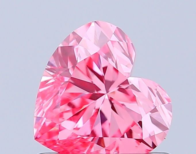 Loose Diamond - HEART 0.83ct Fancy Vivid Pink VS1: Loose Diamond - HEART 0.83ct Fancy Vivid Pink VS1 Source: This is a real non-mined Diamond that has been grown in a lab Shape: HEART Carats: 0.83 Color: Fancy Vivid Pink Certification: IGI Video: