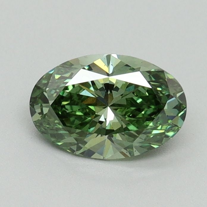 Loose Diamond - OVAL 0.69ct Fancy Vivid Green VS2: Loose Diamond - OVAL 0.69ct Fancy Vivid Green VS2 Source: This is a real non-mined Diamond that has been grown in a lab Shape: OVAL Carats: 0.69 Color: Fancy Vivid Green Certification: IGI Video: